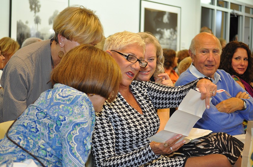 Lillian Sands checks out her raffle prize