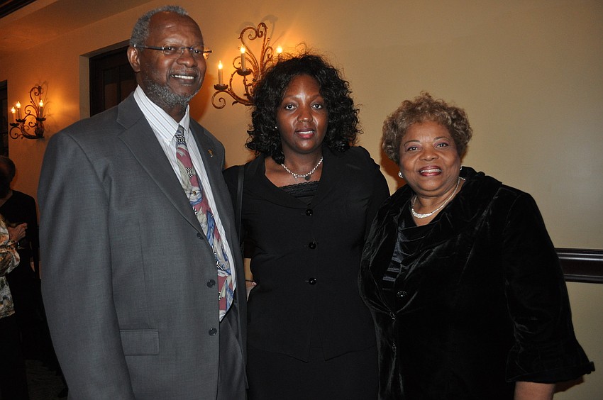 Pastor Lawrence Livingston with his wife, Lisa, and friend, Jeanette Kelly
