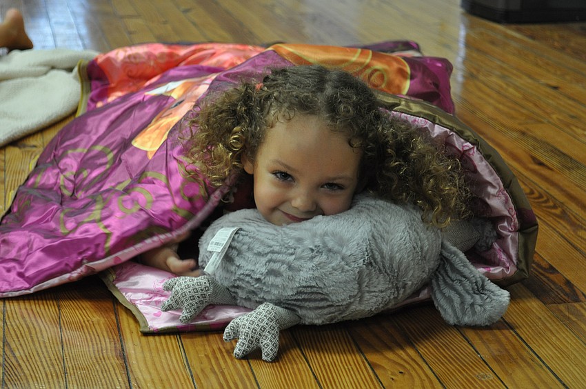 Kirin Singer gets comfortable before the performance.