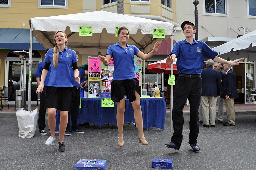 Lakewood Ranch High students Jillian Smith, Julia Barrow and Joseph Grosso perform a shuffle combination to help raise funds for the Mustang Players.