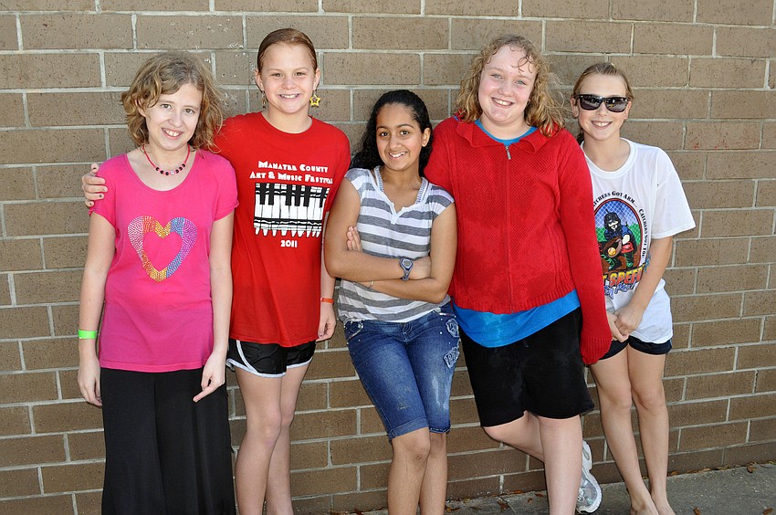 Fifth-graders Rebecca Watters, Kileigh Grace, Ashreeti Sharma, Angela Baldino and Jamie Loring take a break from getting pelted with water sponges.