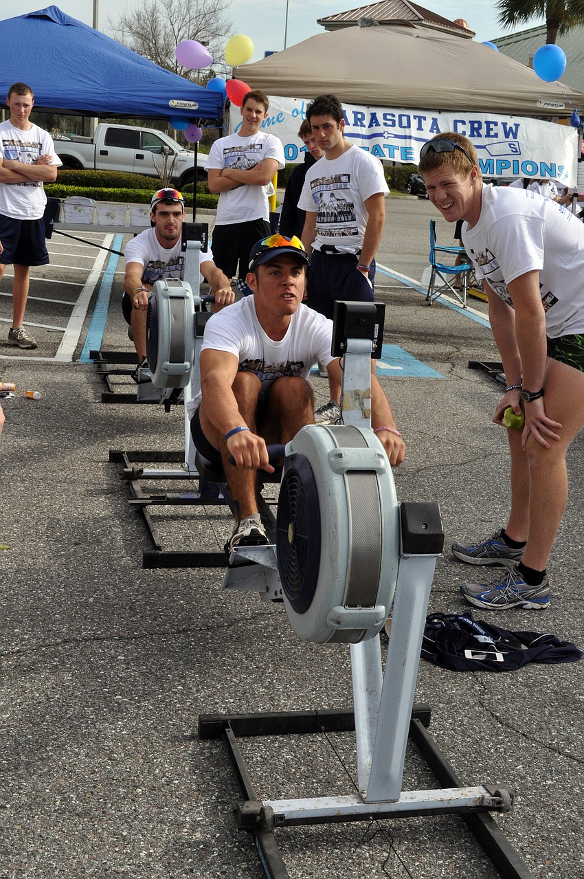 Assistant captain Jose Colon, front, and captain Ryan Houser, back, practice racing together.