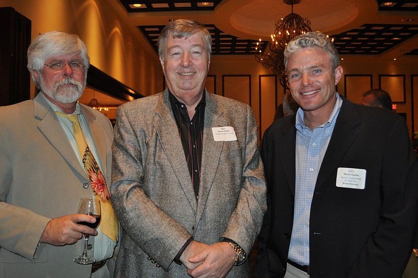 Tom Walker and Brent Parker, both of Parker Walker Group, with David Karins, of Karins Engineering Group