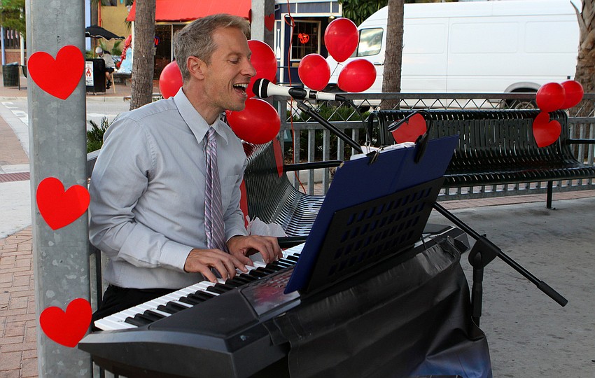 Grant Boxleitner played love songs on the piano in the gazebo.