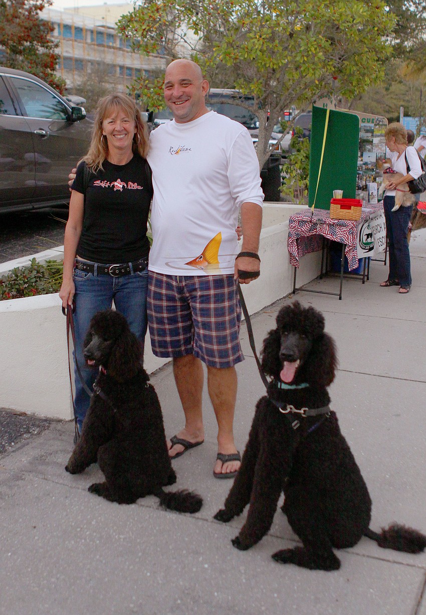 Laura and Joe Lucas with Mya and Kody