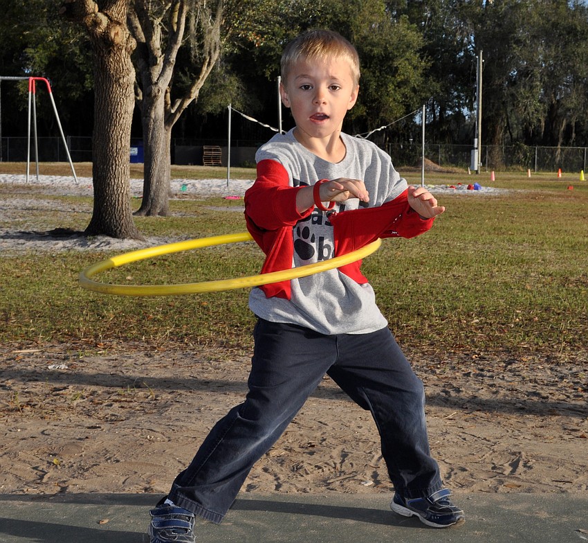 Six-year-old Justin McClung wasnâ€™t quite sure how to hula-hoop, but he kept trying until he figured it out.