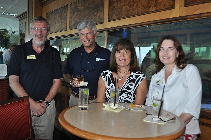 Ed Nugent with Cornerstone Signs and Graphics, Steve Heinz with Grimefighters, Allie Hueter with GCSI Paintscaping and Tammy Overgaard with Service Painting of Florida