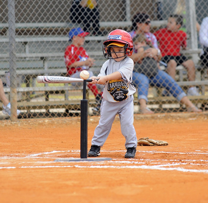 Three-year-old Carter Okuhara got a hit in his trip to the plate.