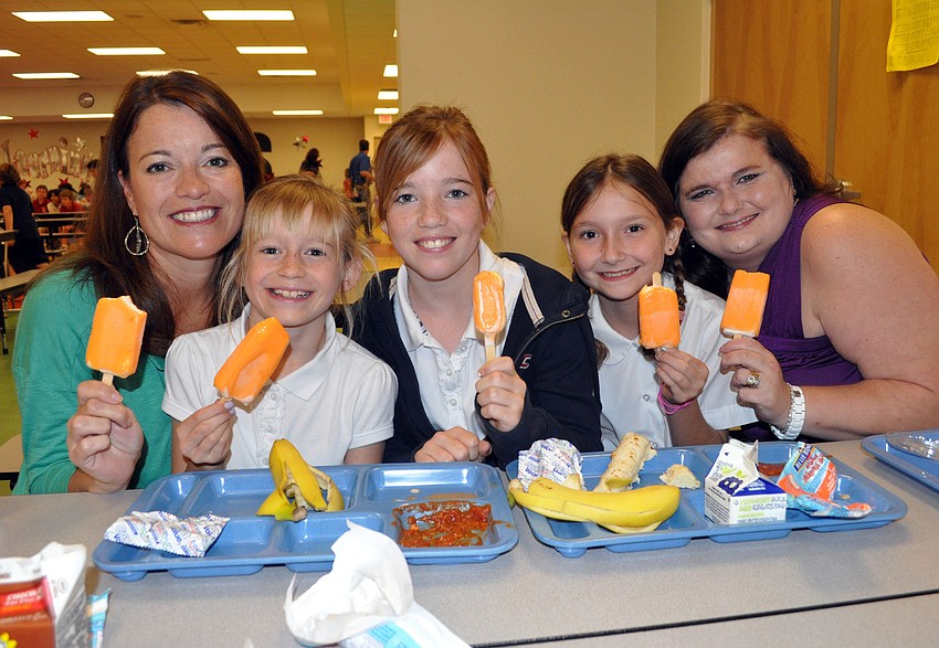 Shirley Ridenour and her daughters Emily, 8 and Katie, 11, and Brelynn Myers, 9, and her mom Christy made sure to grab a dreamsicle after lunch.