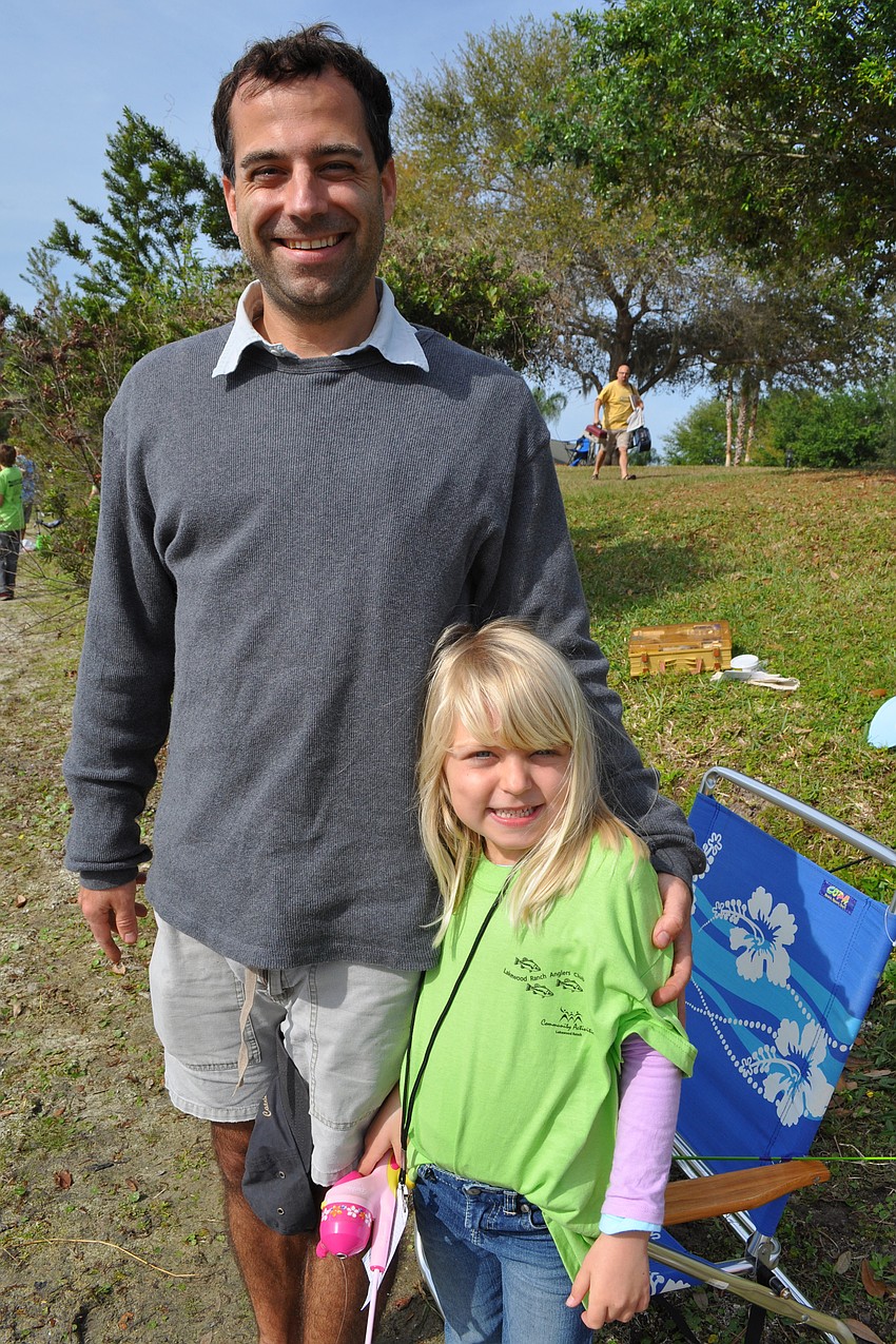 Rick DeVictor helped his daughter, Lucia, at her first fishing tournament.