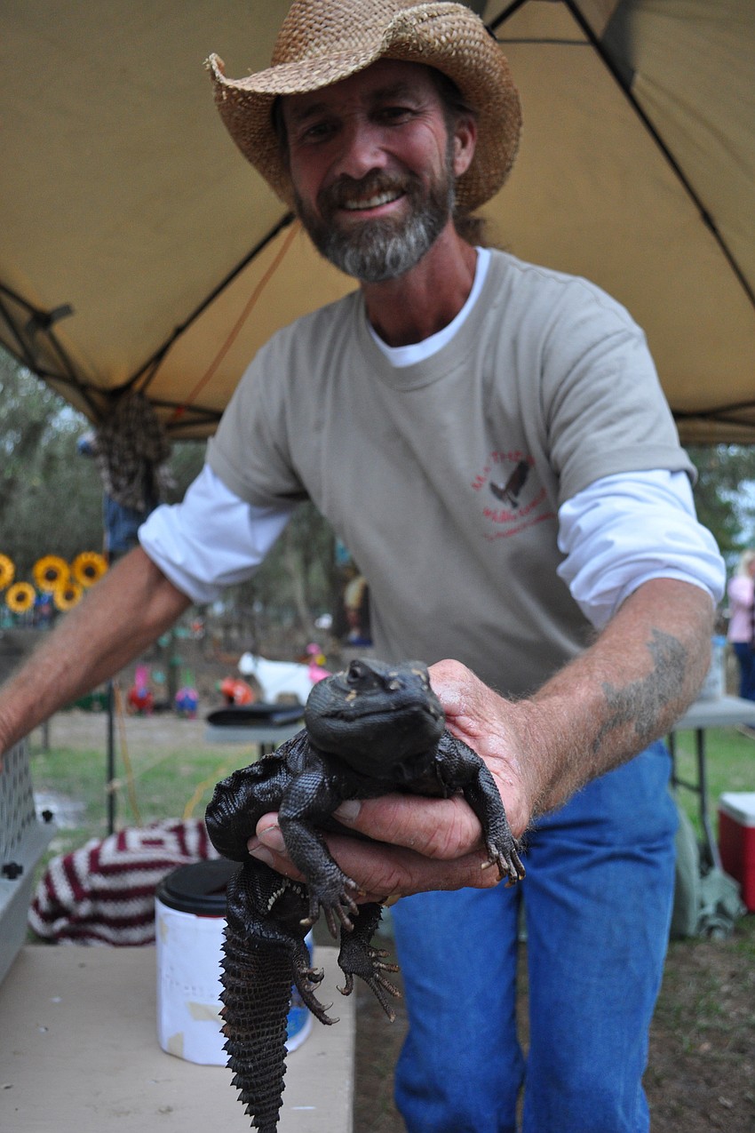 Wildlife rehabilitator Justin Matthews showed off Jaba, a uromastix lizard.