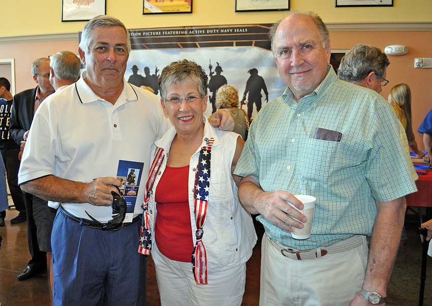 Rosedale residents Jim and Deb Kehoe and Ed Curtis admire and respect what the Navy SEALs do.