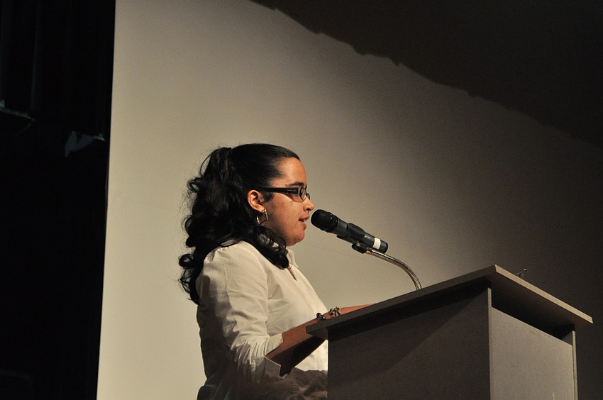 Aliana Diaz recites a poem she wrote about racism