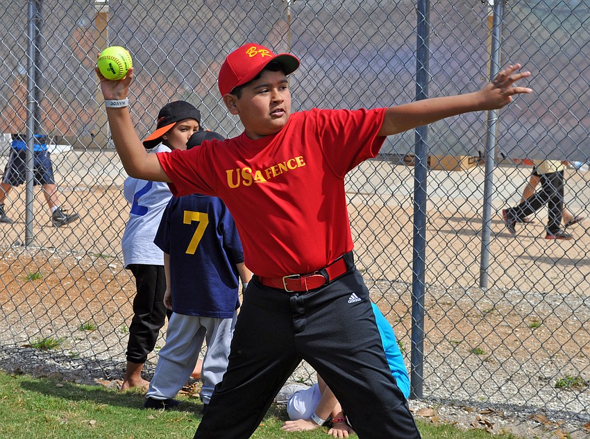 Ten-year-old Ruben Mendoza tried his hand at the dunk tank.
