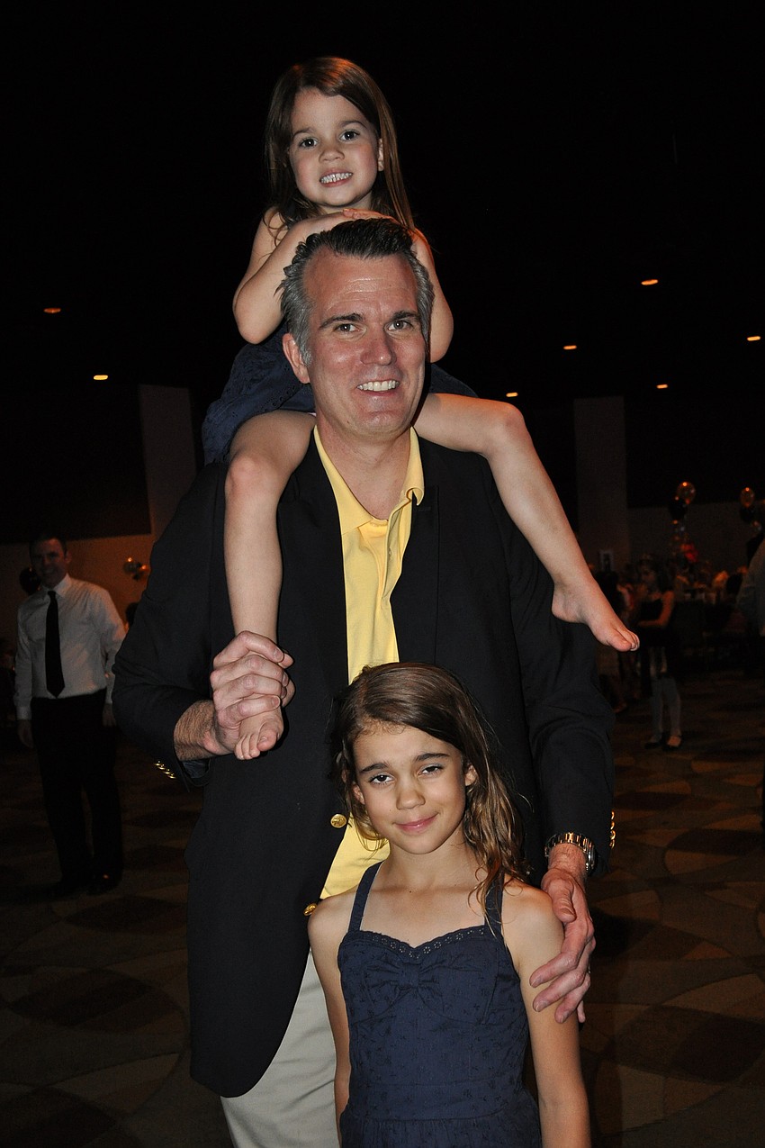Guy Neff enjoyed the night with his daughters, Isabella, above, and Katie, front.