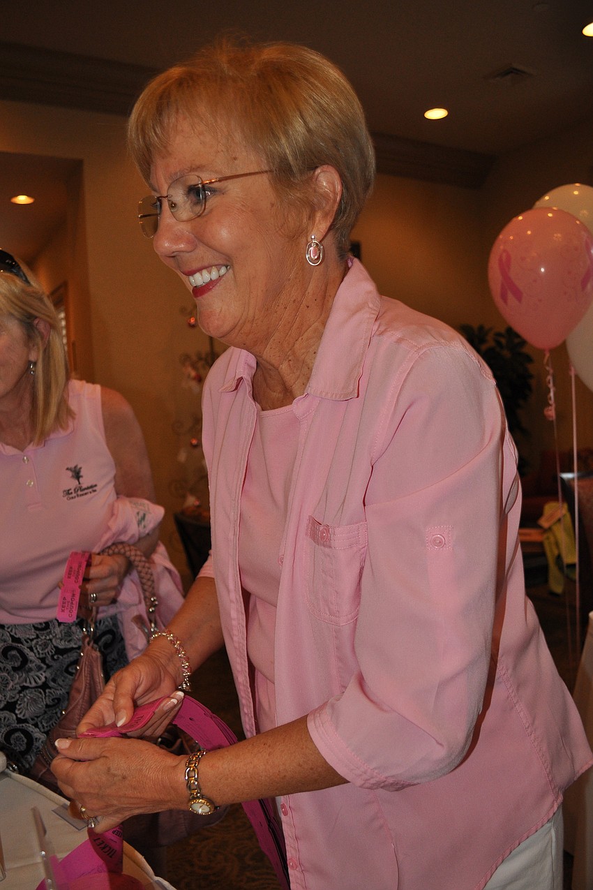 Connie Sanders got raffle tickets ready for guests.