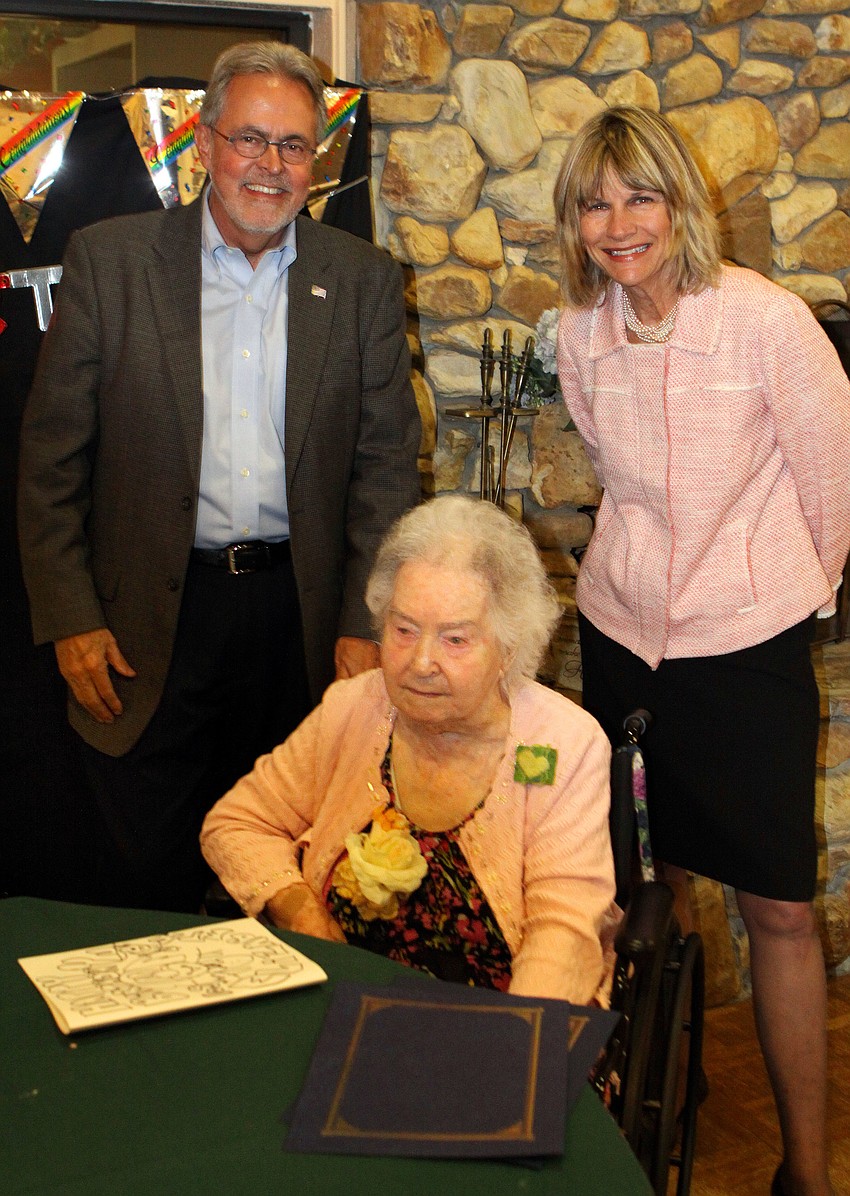 Commissioner Joe Barbetta and Mayor Suzanne Atwell pose with Elizabeth Delaney at her 109th birthday party, Monday, March 9, at the Senior Friendship Center.