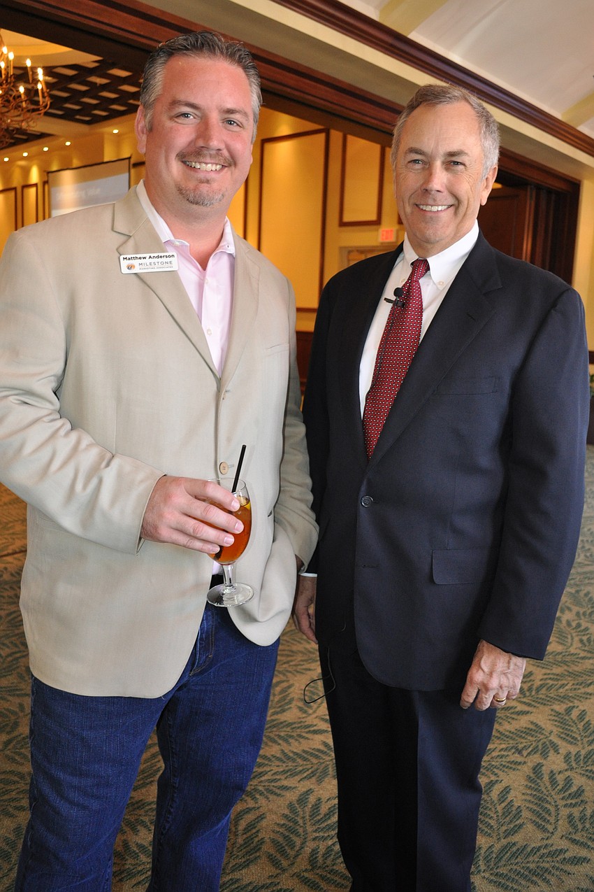 Matthew Anderson, of Milestone Marketing Associates, with event speaker Mark Thompson, of Partner Decision Process International