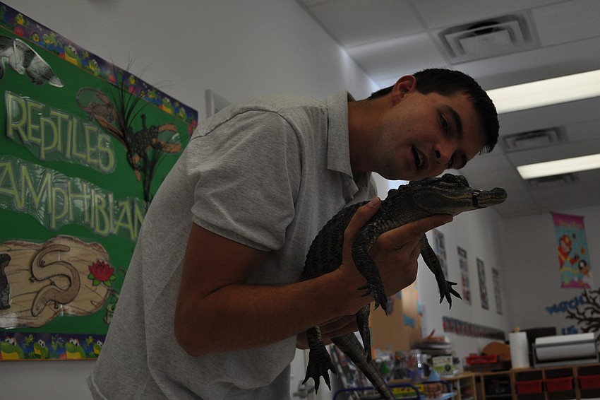 Sarasota Jungle Garden's Dane Gottsch showed students Tinkerbell, the alligator.
