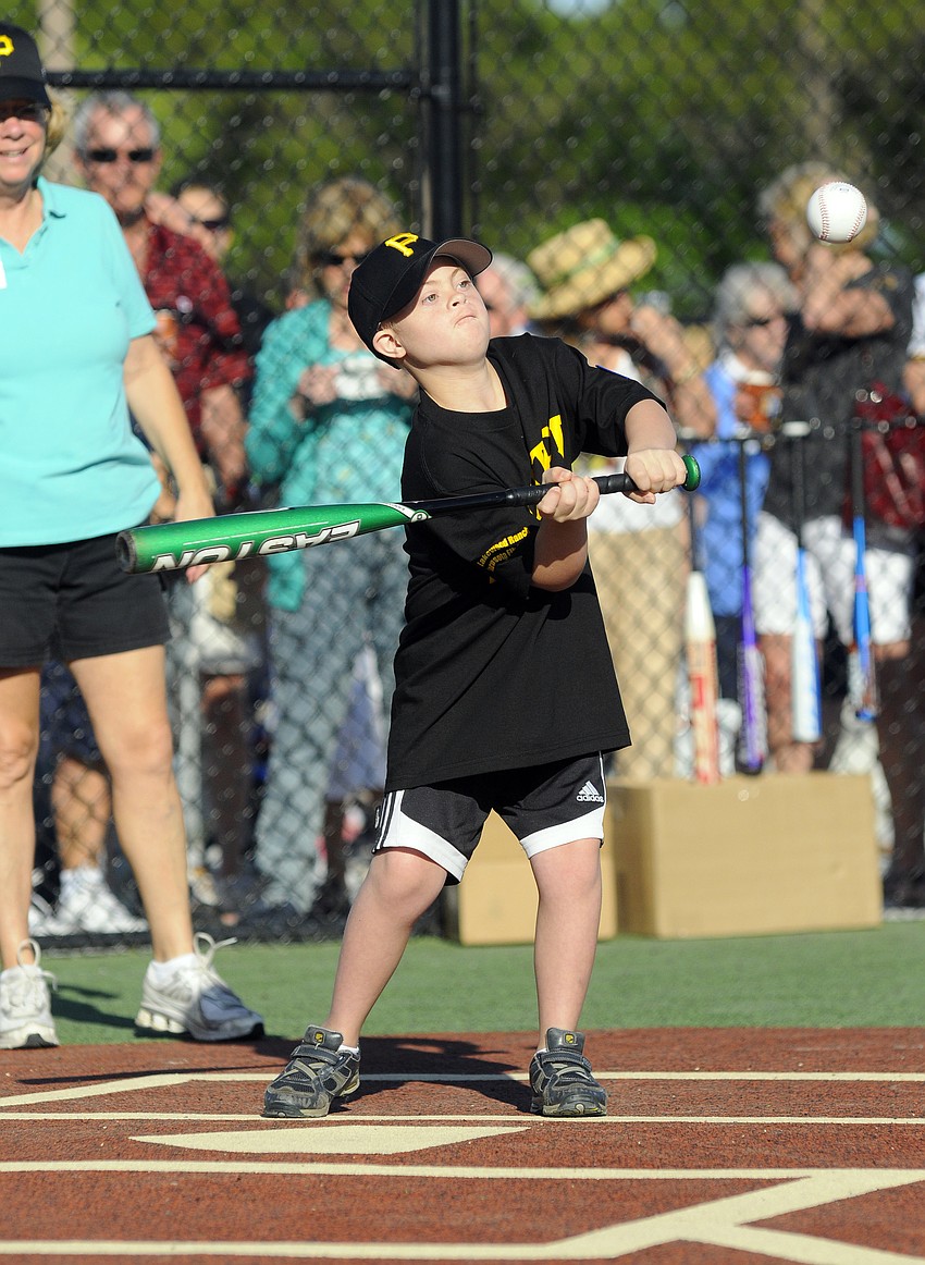 Ten-year-old Joey Baar fouled off several pitches before hitting a line drive.