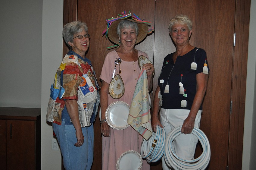 Marilyn Aldrich in a flower top with bell-bottoms, Valerie Barr in a dinner dress with a straw hat and Peg McAllister in a Tea-shirt with matching hose.
