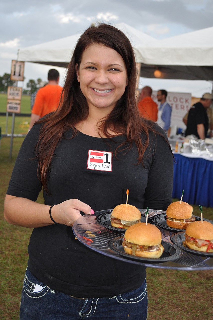 Square 1 Burgers' Sarah Doyle passed out samples.