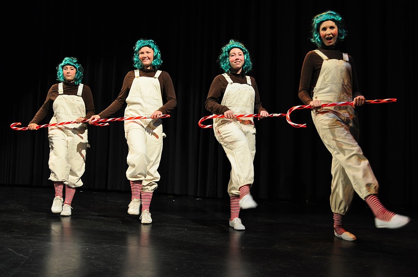Oompaloompas sing and dance about chocolate.