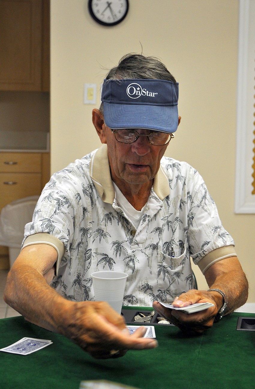 Bob Dieckmann deals out the cards.