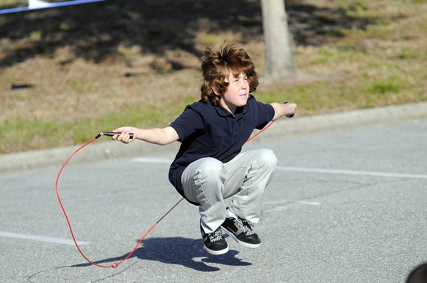 Dylan Blair, 11, demonstrated the frog.