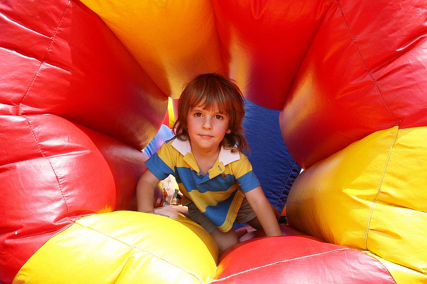 Justin Quinn, 3, made it all the way through this inflatable obstacle course.