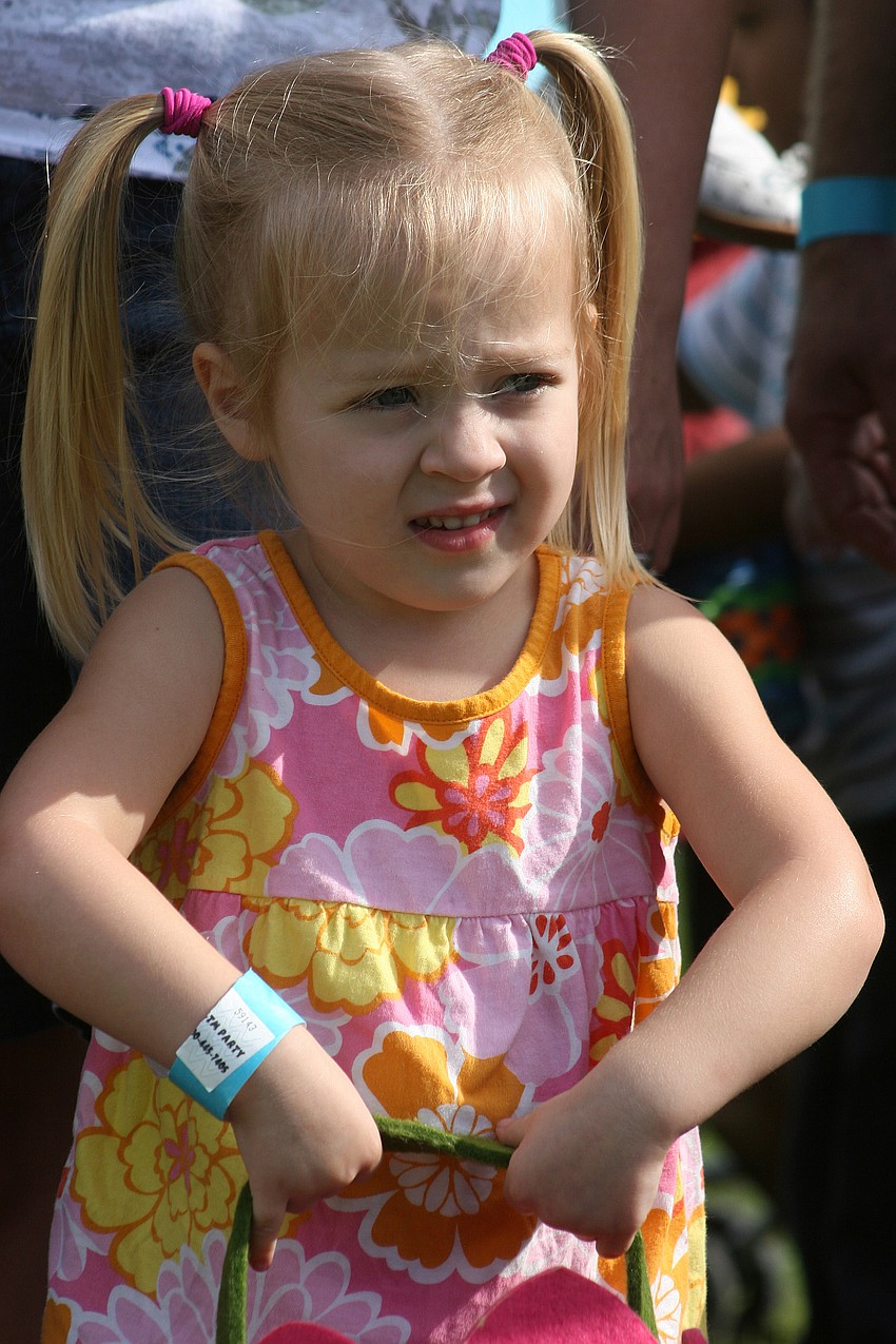 Gabrielle Hotaling, 3, planned her route carefully before the hunt began.