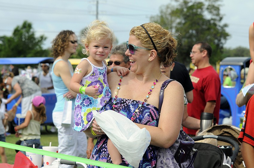 Two-year-old Laylah Camus danced with her mom Mindie while waiting for the helicopter to arrive.