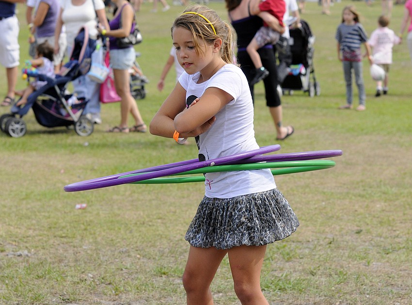 Ten-year-old Taylor Radigan got an intense workout in at the hula-hoop station.