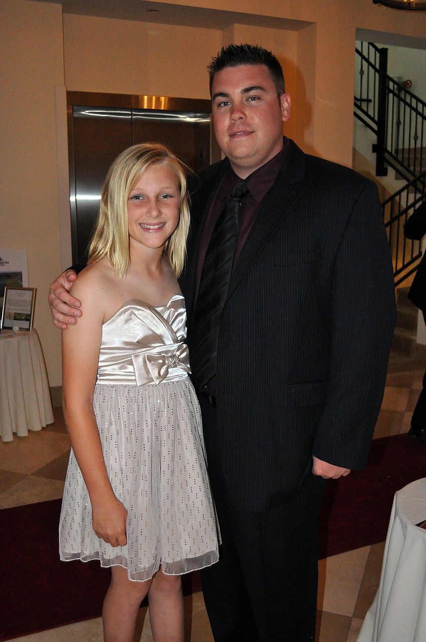 Twelve-year-old Humane Society at Lakewood Ranch volunteer Sydney Ashley, pictured with her cousin James Struble, helped organize the gala.