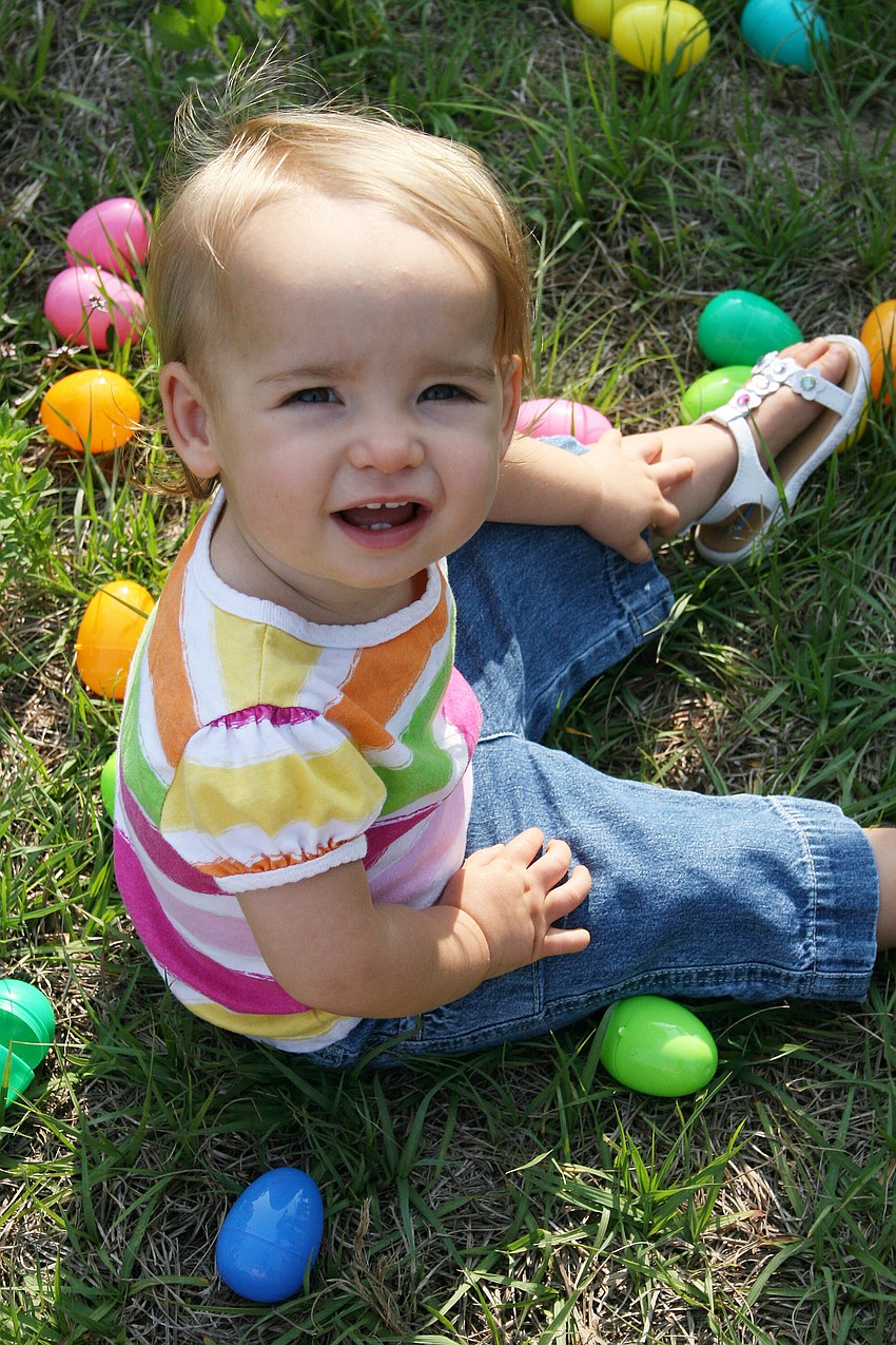 Addison Wilson, 15 months, didn't mind being in the center of a huge pile of eggs at Harvest United Methodist Church.