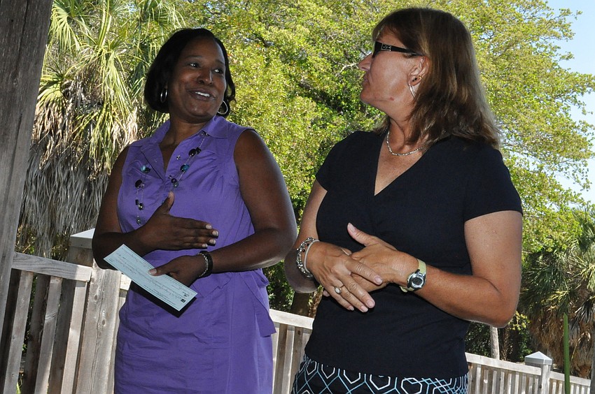 Principal Ann Broomes and LeeAnn Fronckowick thanked the Garden Club for the $1,000 grant to the G.D. Rogers Garden Elementary School garden, which will help restore it and clean up the vandalism that had occurred