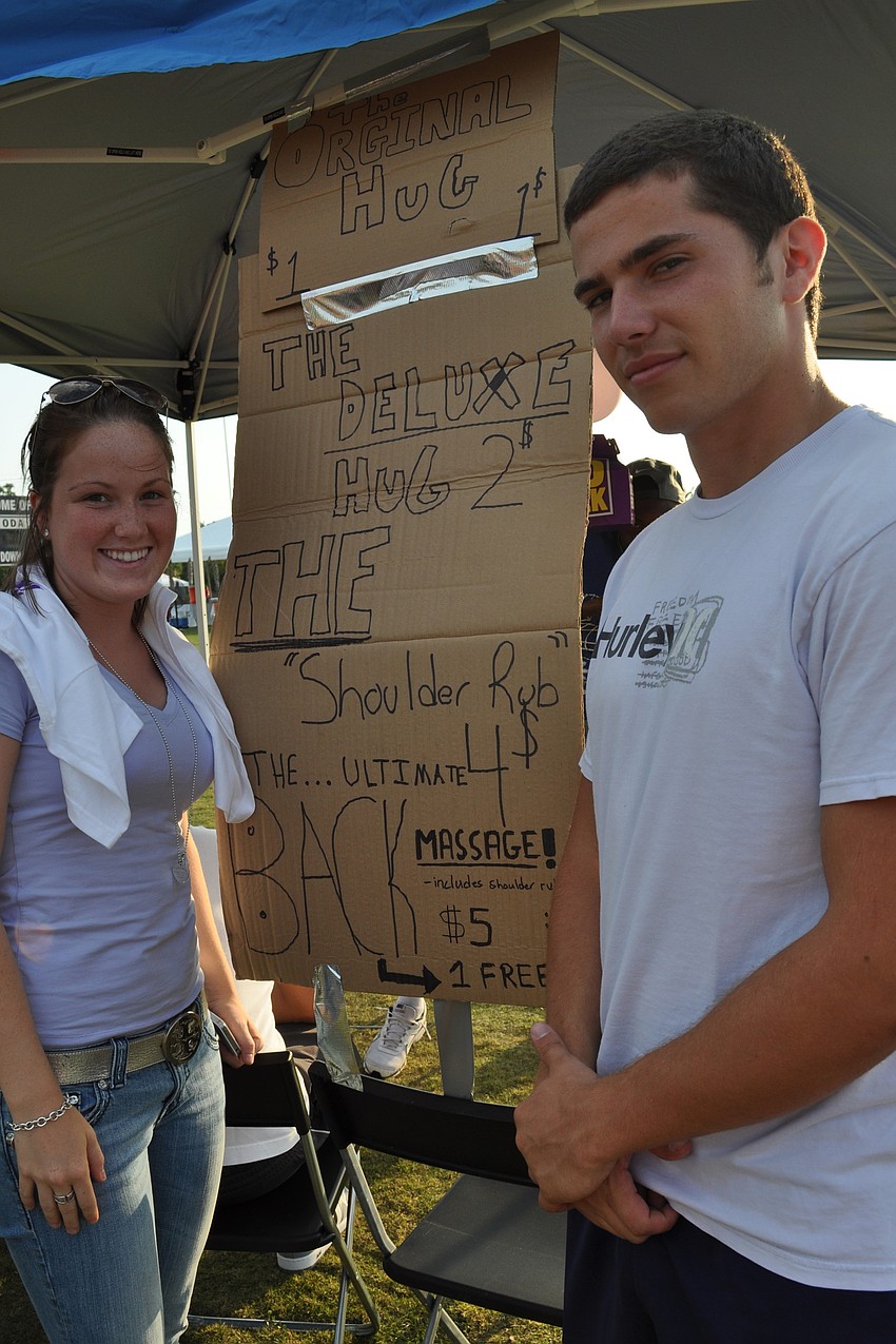Katherine Berg and Sam Kimmel sold hugs and massages with Team Sam Kimmel.
