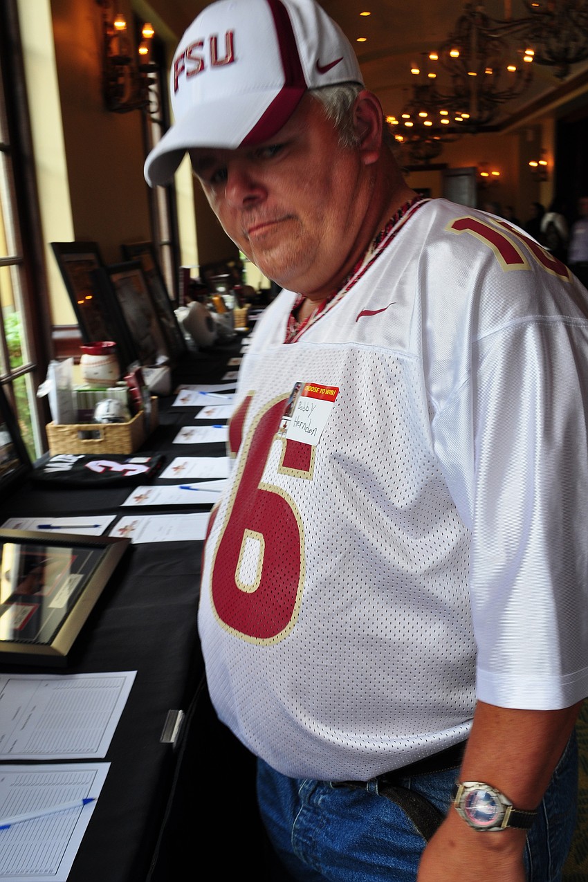 Bobby Herndon checked out the auction items.