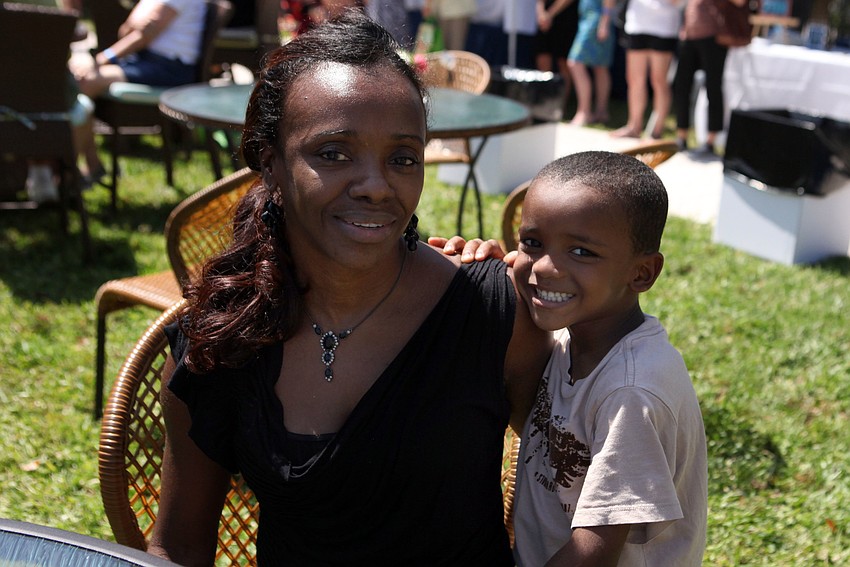 Frances Willett with her son, Matthew Willett, 5, at the All Faiths Food Bank Jazz Brunch in the Park, Sunday, April 1, out at Phillippi Estate Park.
