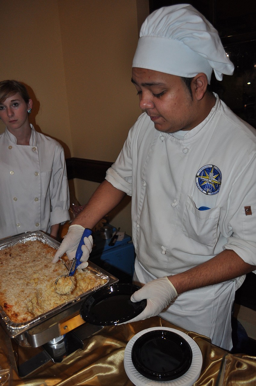 Manatee Technical Institute culinary student Gabriel Ramirez dished out three-cheese lobster macaroni and cheese.