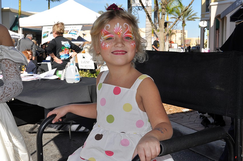 Five-year-old Alyssa Lampertâ€™s eyes lit up when she saw her rainbow princess face paint.