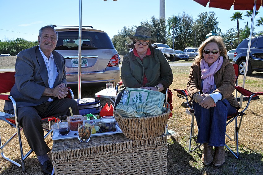 Abigail Shearer Robinson, center, came out to the match with her good friend Leonard Castronuovo and her niece Lexi Osgood.
