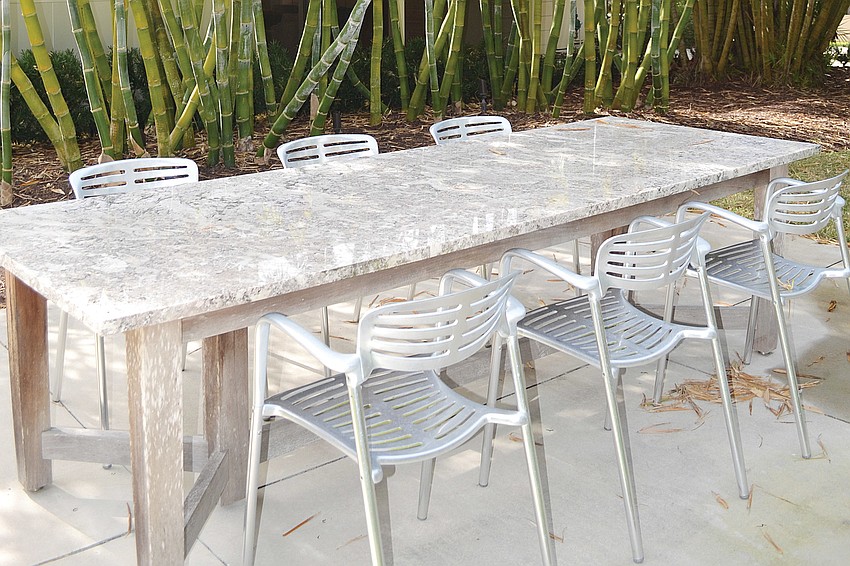 Dennis Rees wanted to create a wall between his house and the outdoor dining area and did so with bamboo.