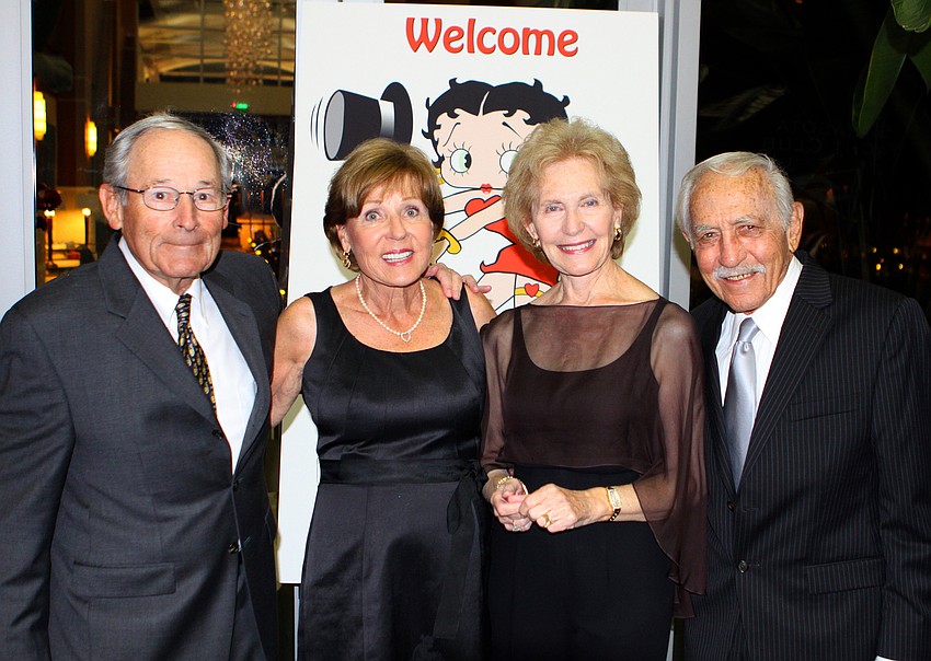 Marty and Marge Heller pose with Elaine and Donald Weill