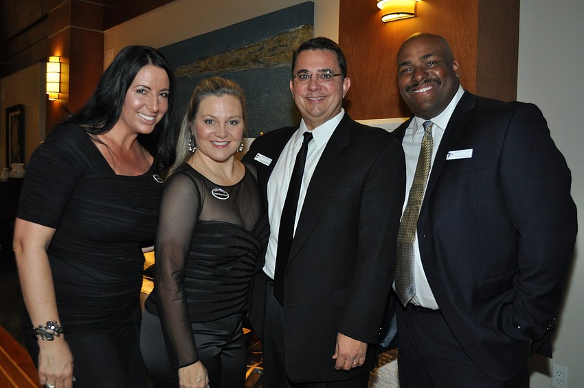 Christina Solomon, Sandy and George Mazzarantani, and retired professional baseball player Bobby Bonilla