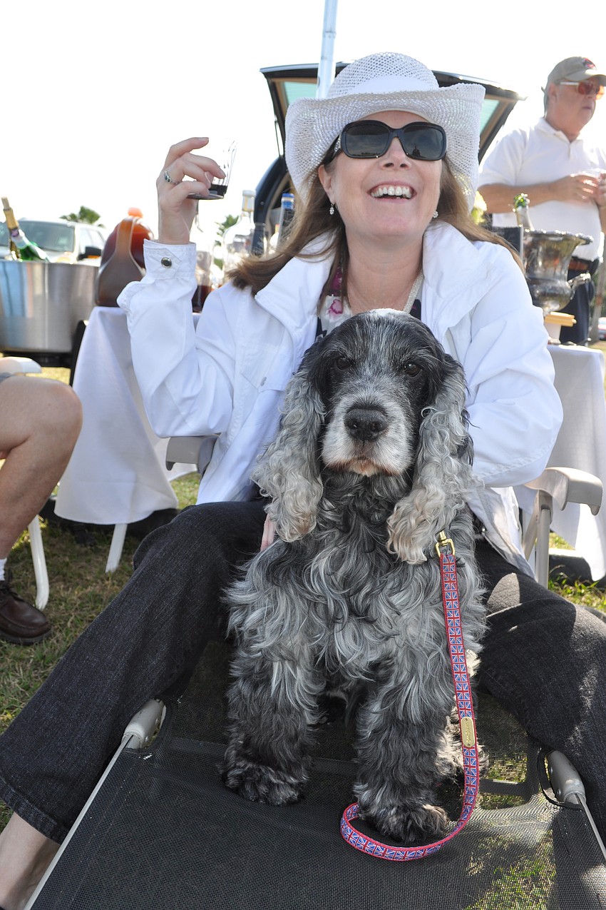 Angela Campanella watched the polo match with her dog, George, and friends.