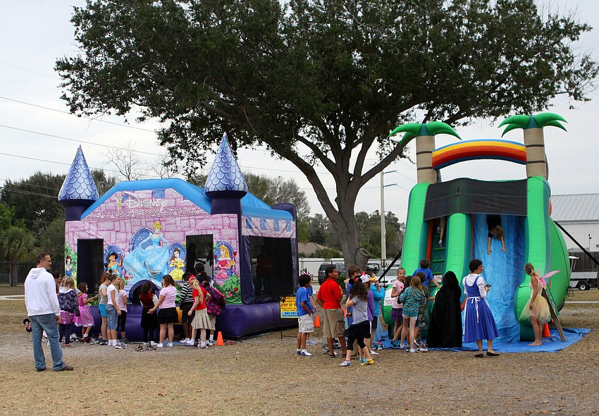 The students enjoyed playing inside a Disney Princess bounce house and sliding down a bounce slide, Friday, Feb. 3, at Phillippi Shores Elementary.
