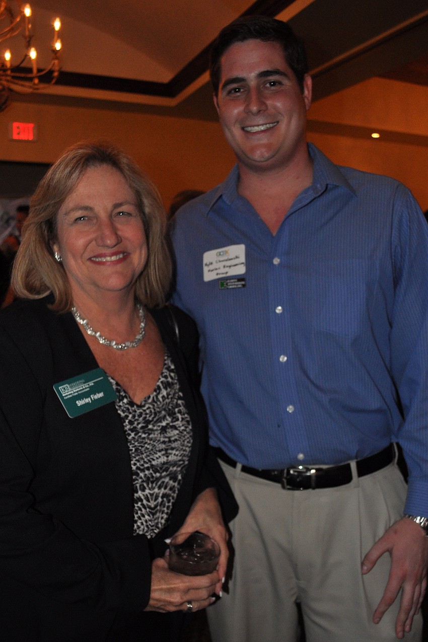 Shirley Fieber, of Kerkering Barberio, with Kyle Chmielewski, of Karins Engineering Group