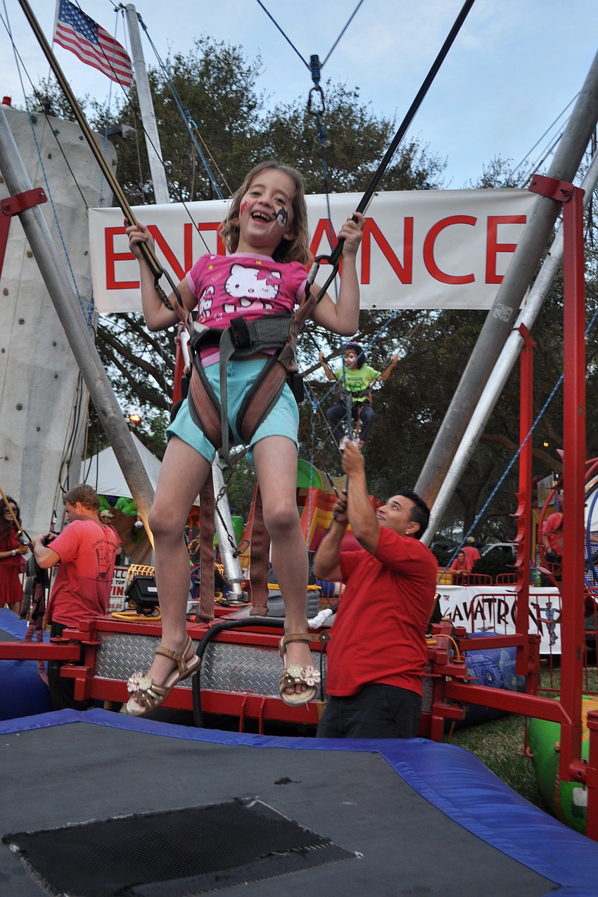 Abby Drake, 5, shrieked in glee as she bounced.