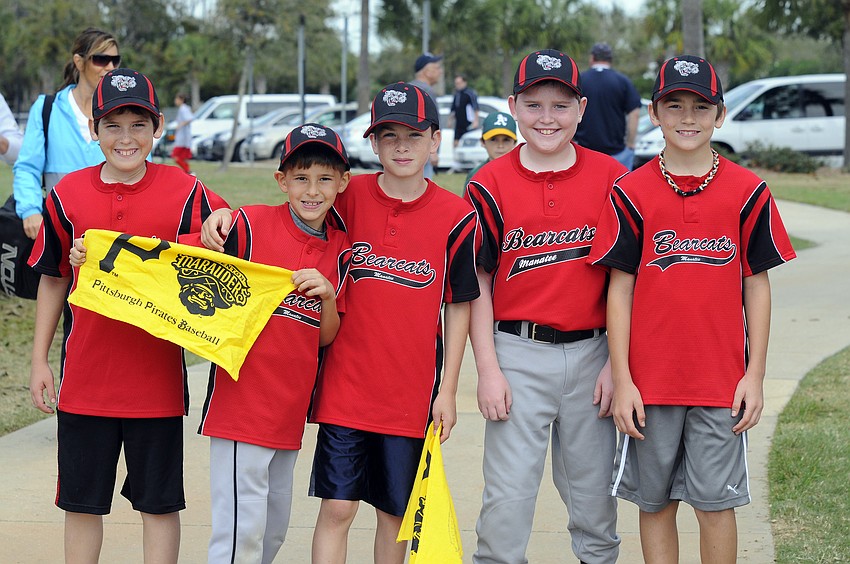 Members of the Manatee Bearcats 10U travel ball team sold raffle tickets throughout the day.